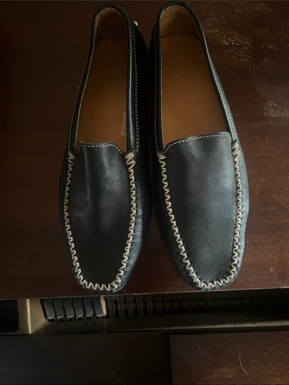 Tod's Black Leather Women’s Moccasin Loafers with Cream Whipstitch
